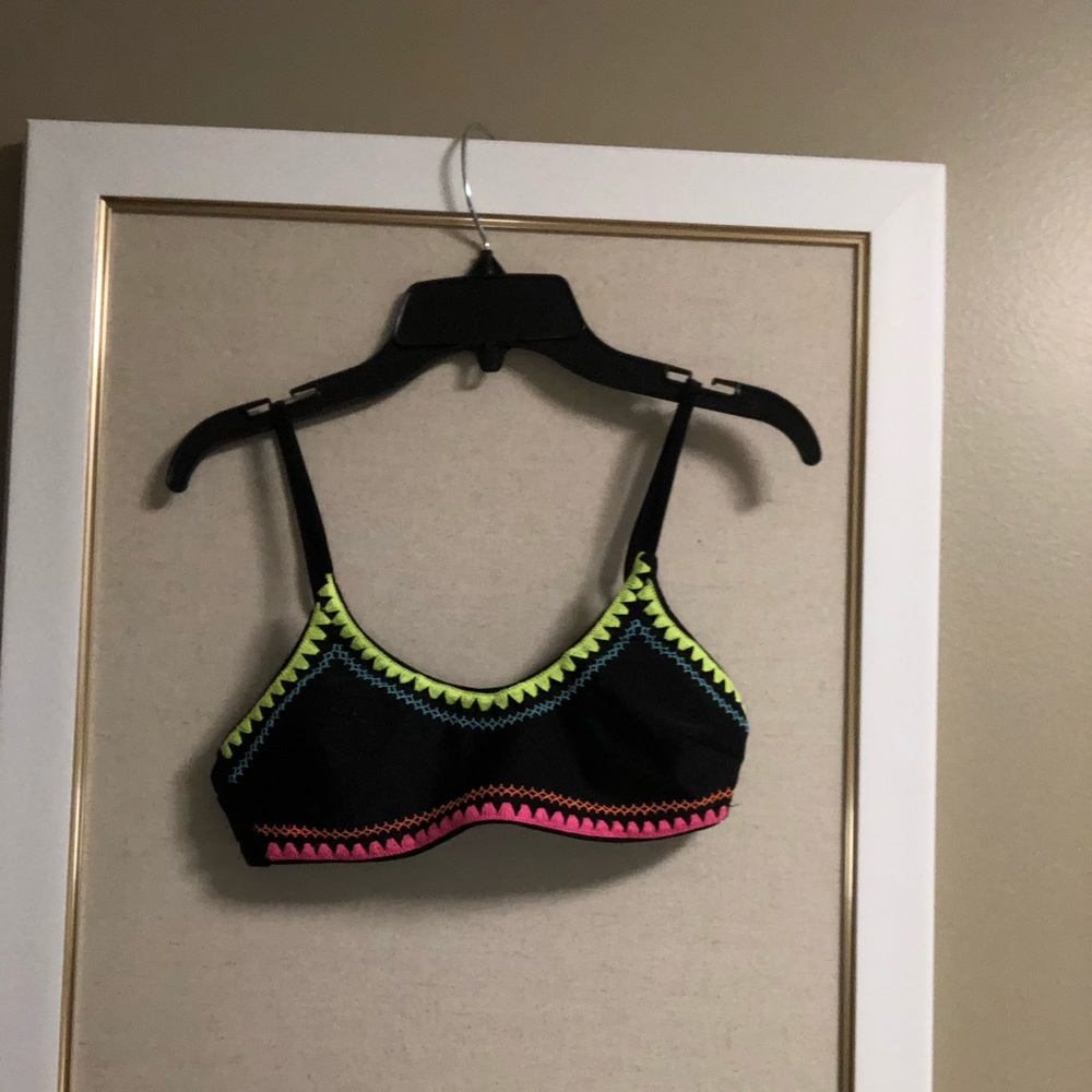 black swimsuit with neon accents